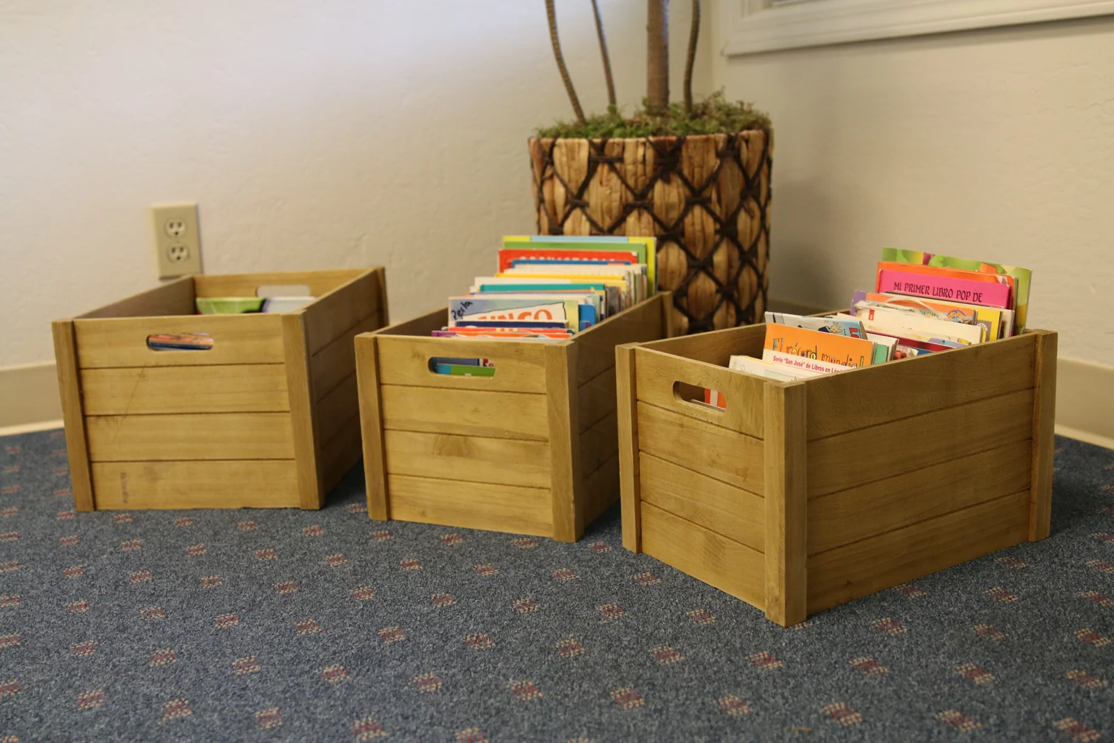 Baskets of reading books at the tutoring center